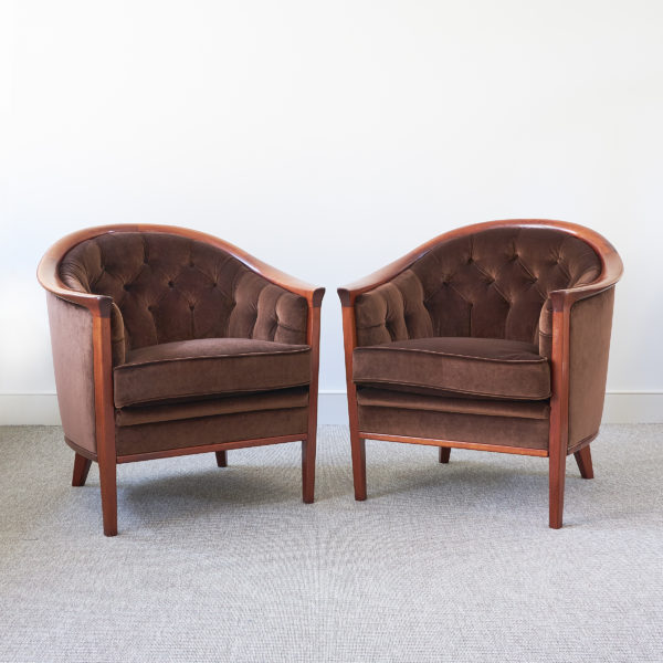 Pair of Swedish mahogany ‘Aristokrat’ buttoned club chairs by Bertil Fridhagen