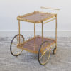 Lacquered brass two-tier drinks trolley