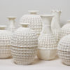 Blanc de Chine pierced basketwork porcelain vessels