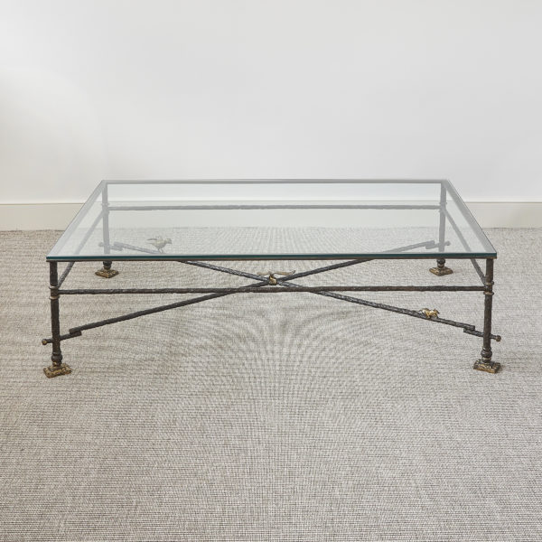 Glass mounted parcel-gilt wrought iron coffee table in the manner of Diego Giacometti