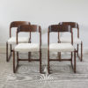 Set of four French rosewood ‘Traineau’ or sledge dining chairs by Emile and Walter Baumann