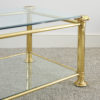 Brass and glass mounted two tier coffee table, probably Italian