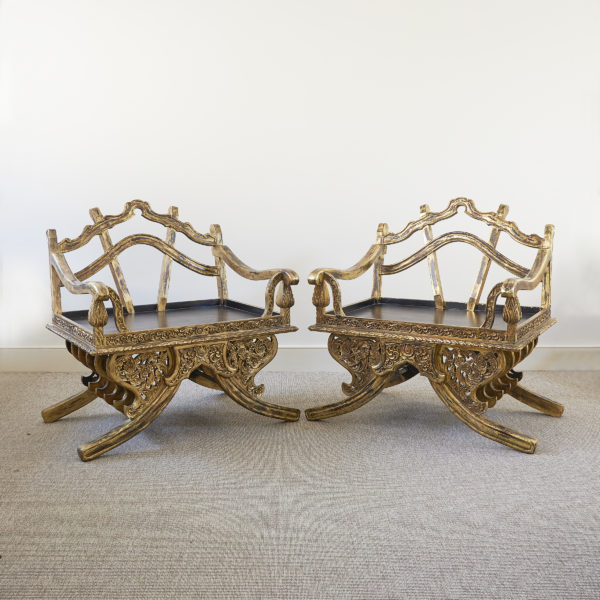 Pair of antique Thai carved, gilt and lacquered wood throne chairs