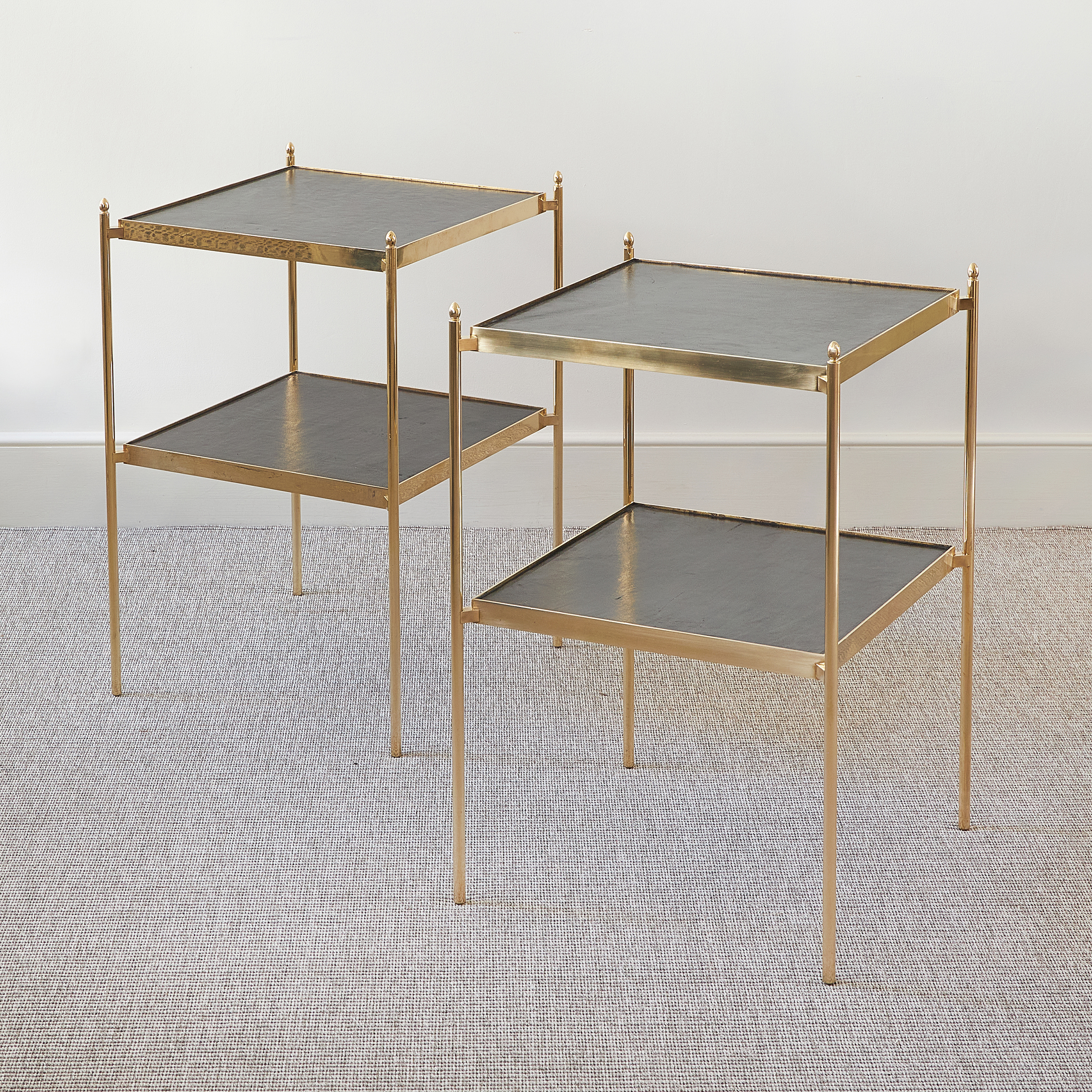 Pair of Scandinavian brass etagere with embossed leather tops, c