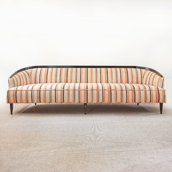 Slender, curved Italian ebonised sofa, c. 1950