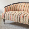 Slender, curved Italian ebonised sofa, c. 1950