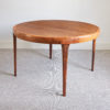 Danish rosewood extending dining table by Ib Kofod Larsen (1921-2003) for Faarup Mobelfabrik, 1960s