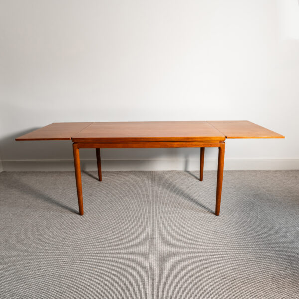 Danish teak extending dining table, designed by Henri Walter Klein for Bramin, 1960s