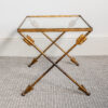 Nest of three gilt wrought iron and glass arrow side tables, c. 1930