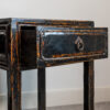 Pair of large Chinese lacquered side tables, first half of 20th Century