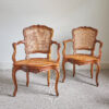 Pair of Louis XVI walnut and cane chairs