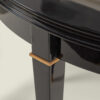 French Mid Century black lacquer fold-over demilune table in the manner of Andre Arbus, c. 1950